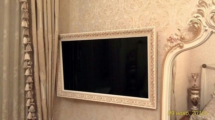 Телевизор в раме на стене фото007